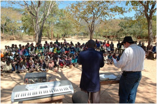Roy preaching in Malawi during aid visit Roy preaching in Malawi